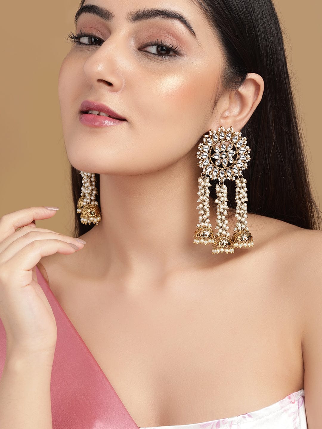Which is the best earring style to wear on a lehenga? - Quora