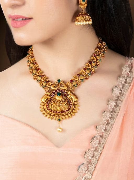 Rubans Gold Plated Handcrafted Traditional Pearl Embellished Faux Ruby And Emerald Studded Divine Lakshmi Necklace Set Necklace Set