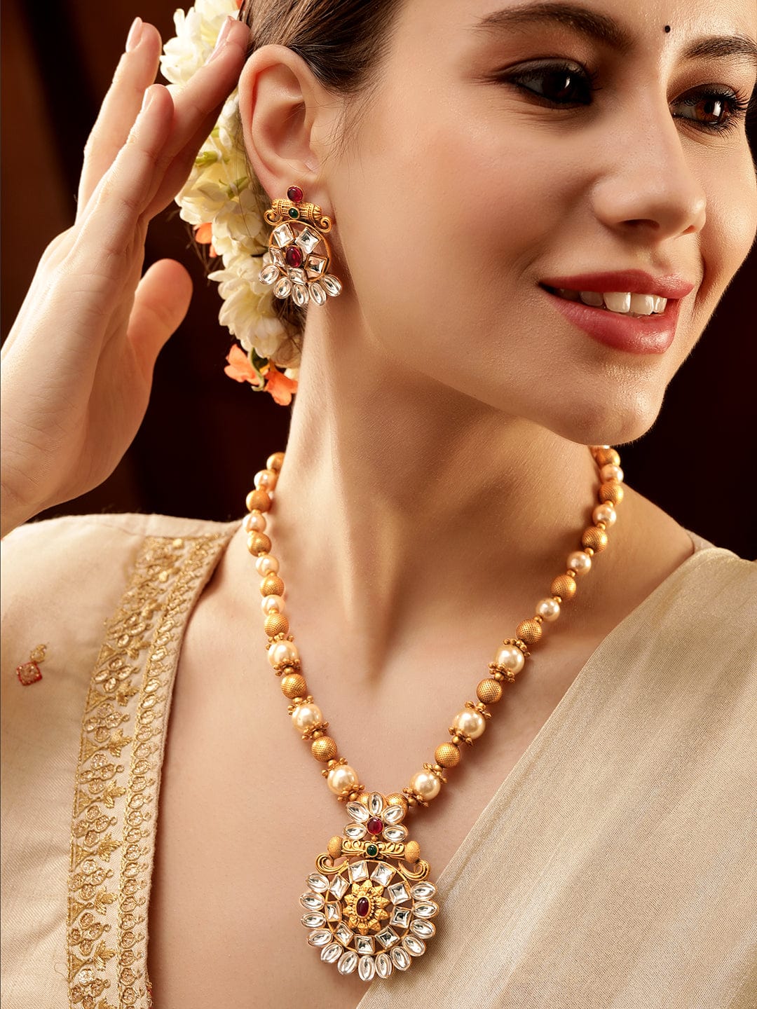 Rubans Gold-Toned Pendant with Dazzling Stones and Golden Off-White Pearls Chain Necklace Set Jewellery Sets