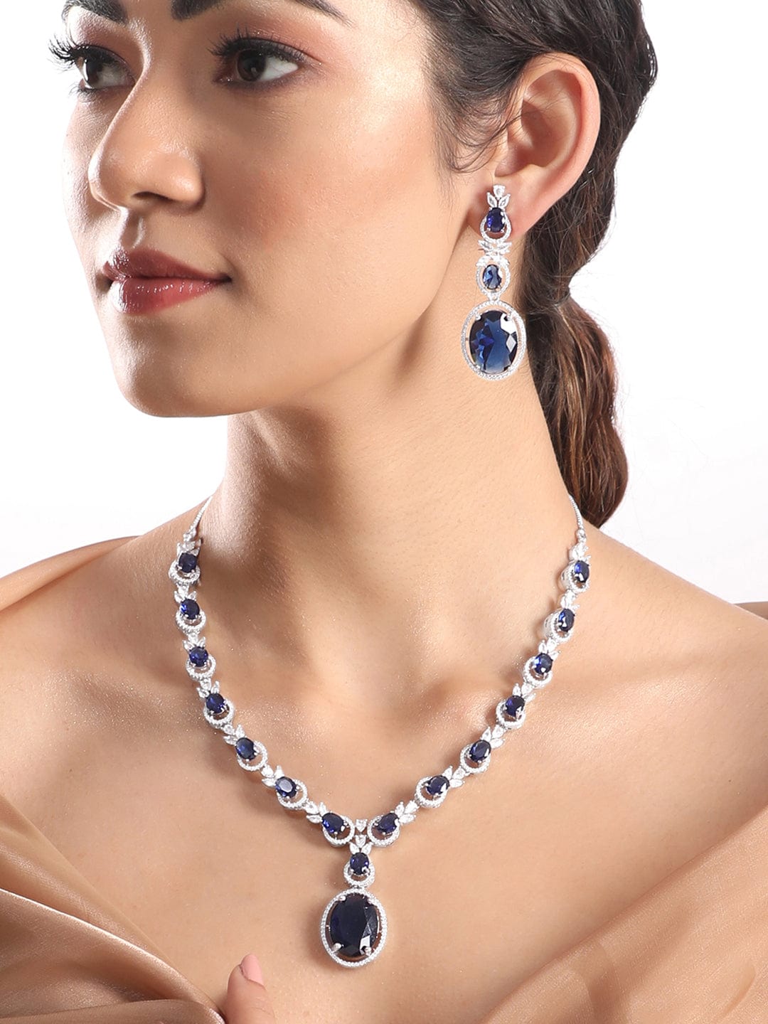 Rubans Rhodium Plated Brilliant Cut Blue Sapphire Zirconia Studded Necklace Set Necklace Set