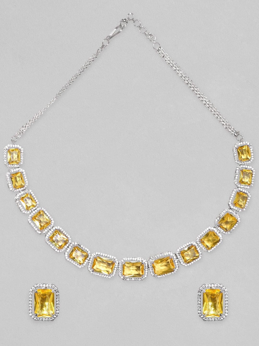 Rubans Rhodium Plated Yellow Sapphire Zircons Studded Necklace Set. Necklace Set