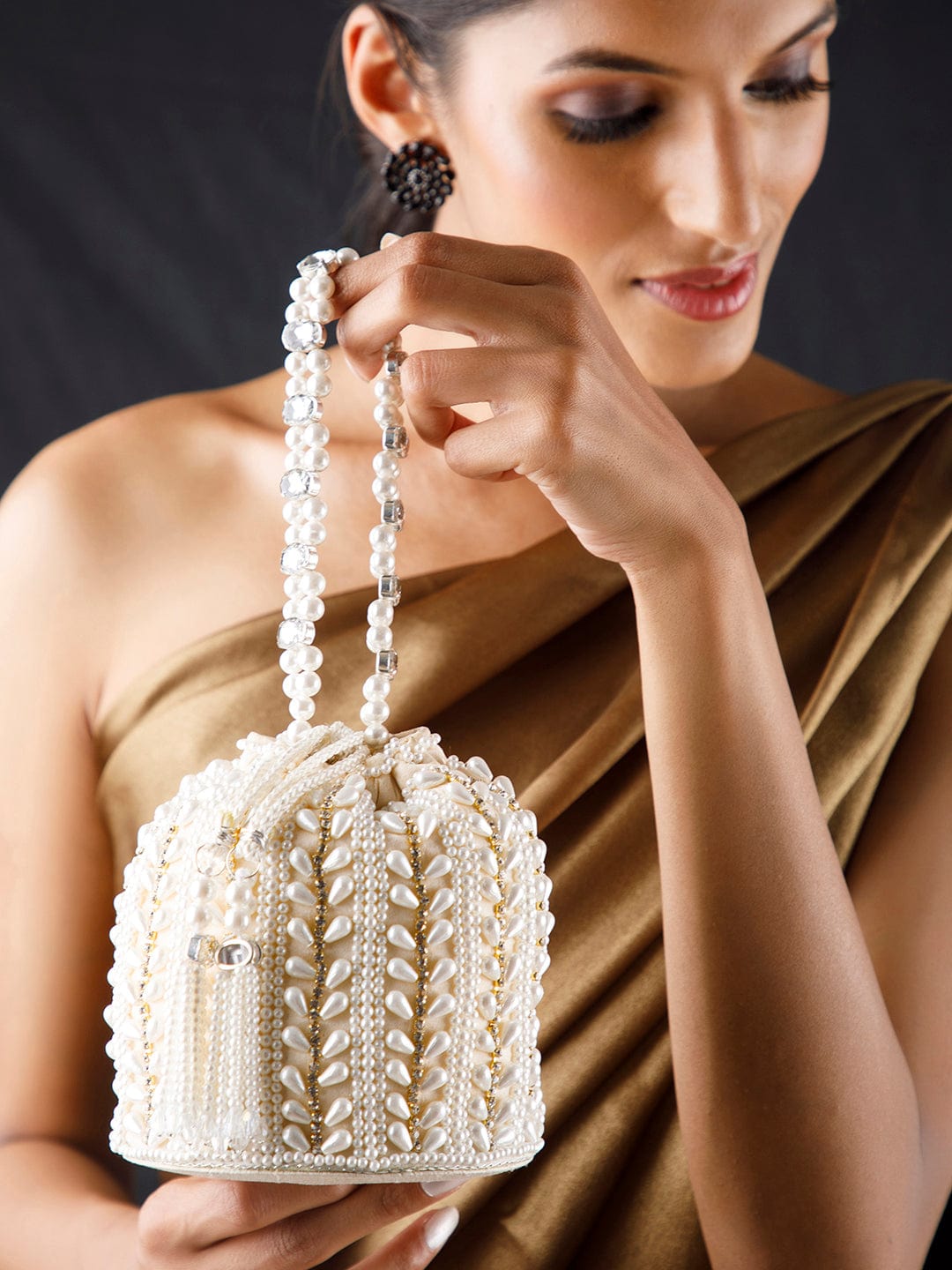 Rubans Off White Coloured Potli Bag With Golden Embroided Design And Pearls. Handbag & Wallet Accessories
