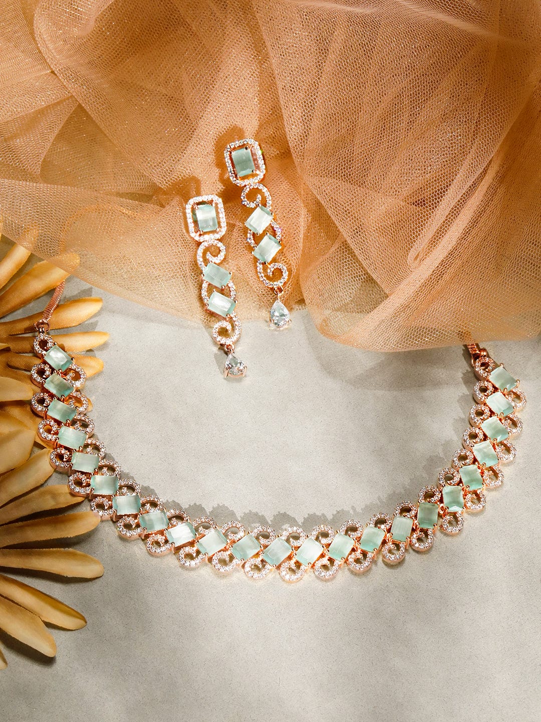Rubans Rose Gold Plated Pastel Green Studded American Diamond Necklace Set. Necklace Set