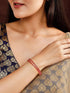 Rubans Set Of 4 Gold-Plated & Pink AD-Studded Bangles Bangles & Bracelets